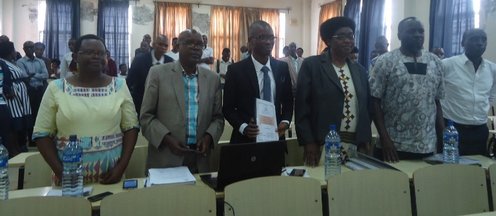 ENS Burundi officials and participants standing during an academic conference session