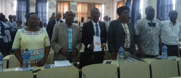 ENS Burundi officials and participants standing during an academic conference session